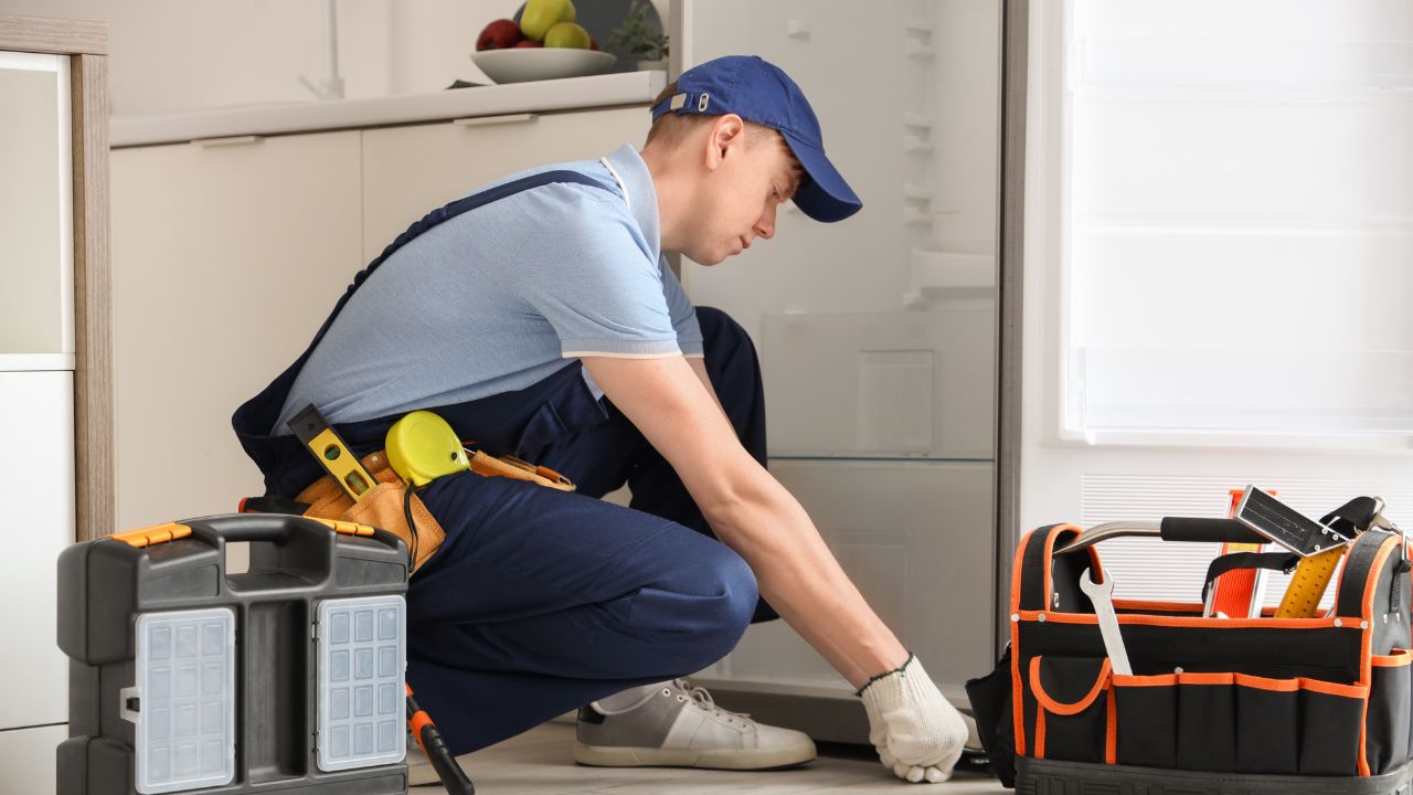 Technician%20performing%20home%20repair Technician%20performing%20home%20repair